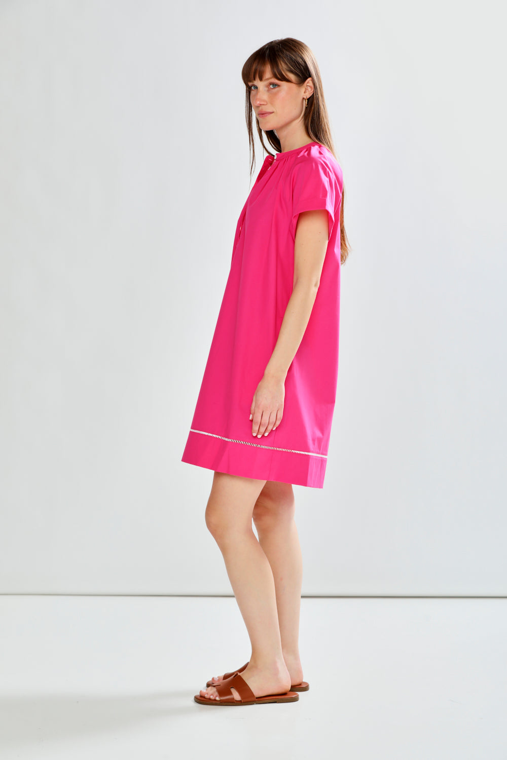 woman in fuchsia dress