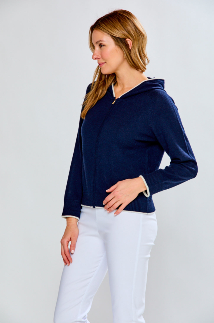 Woman in cardigan with hood