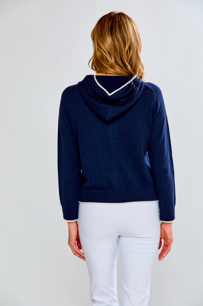 Woman in cardigan with hood