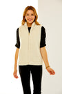 Woman in shearling vest