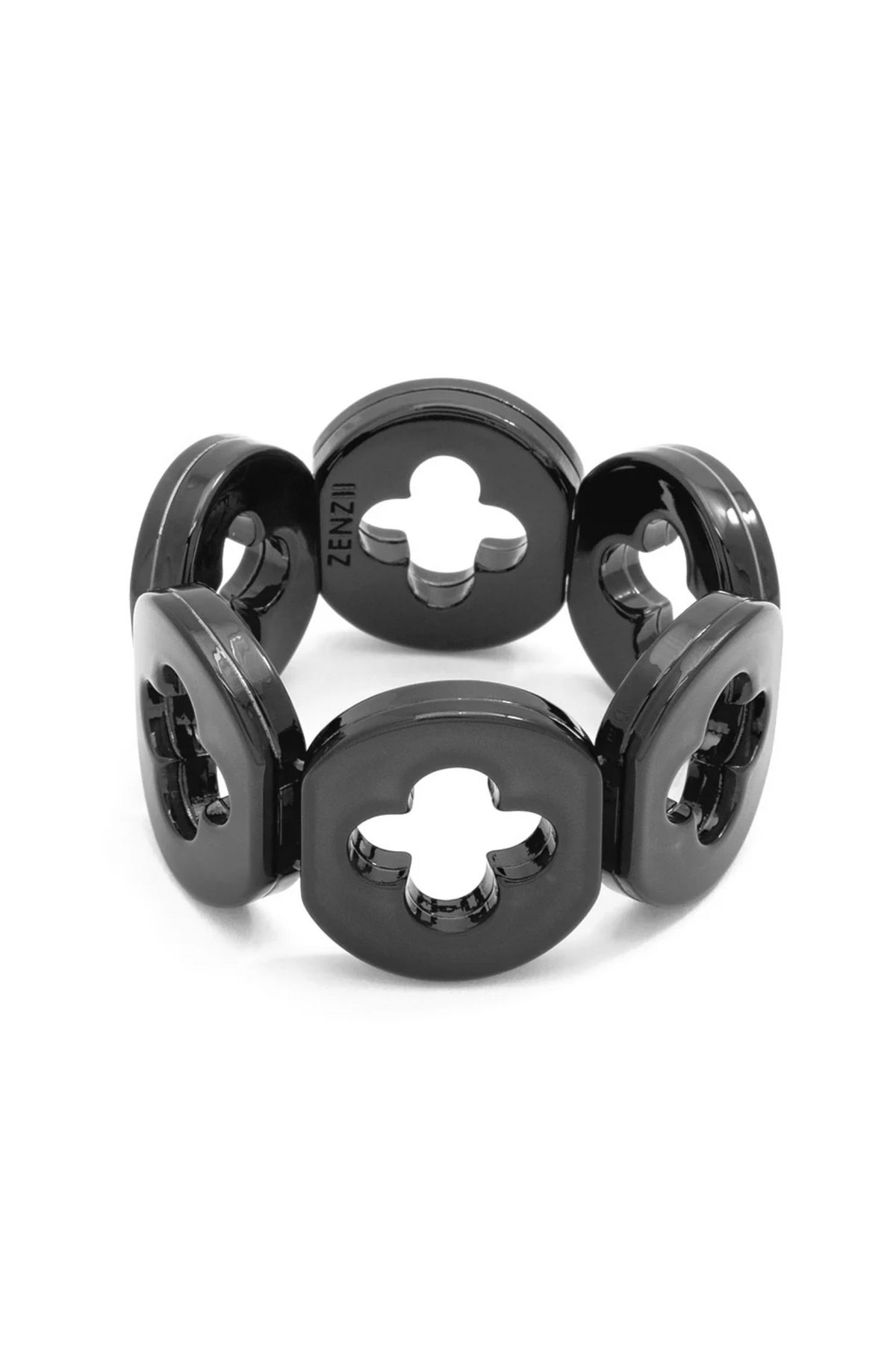A black stretch bracelet made of circular links with a central clover-shaped cutout, shown on a plain white background.