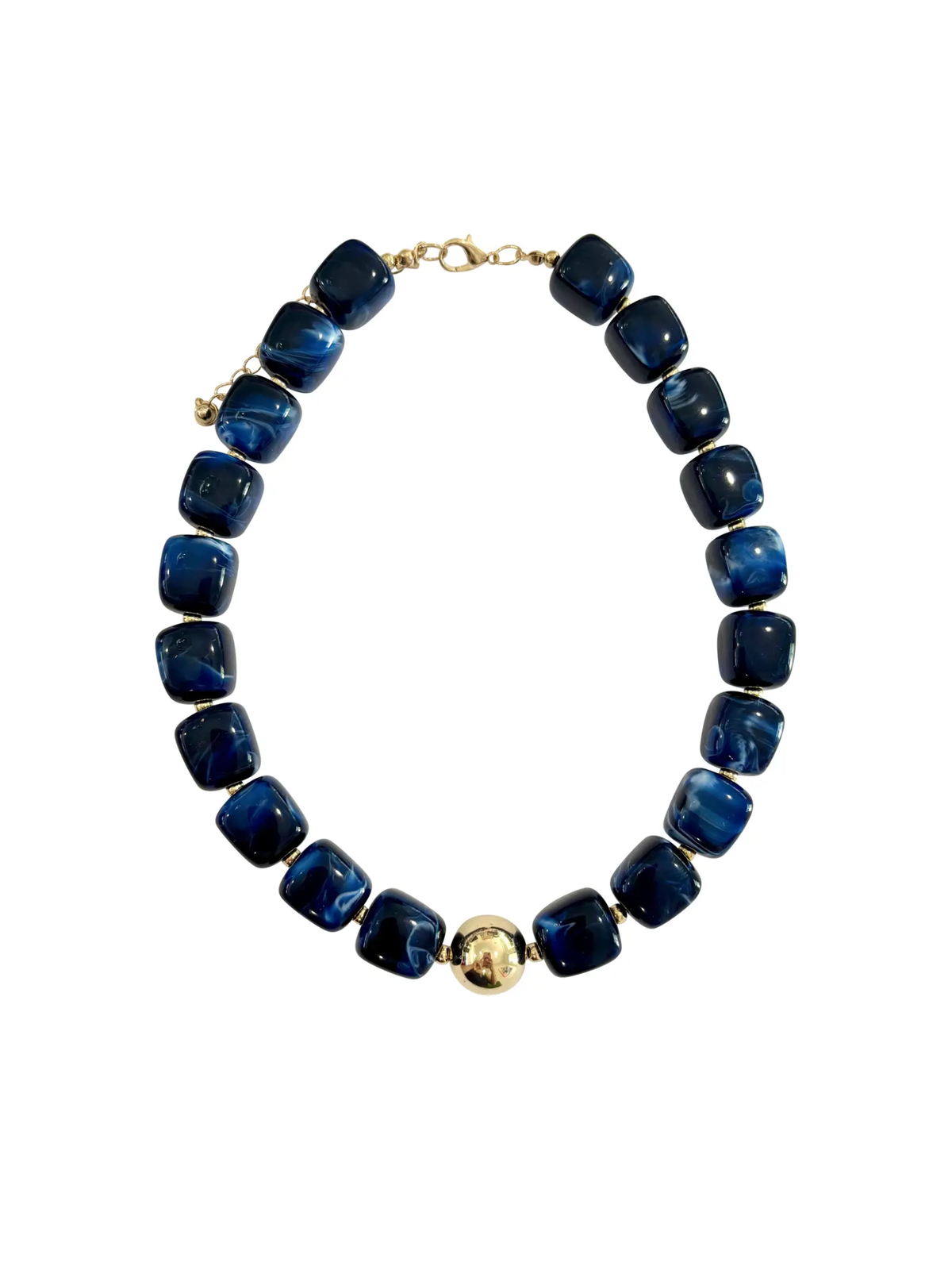 The Massey Chunky Beaded Necklace - Navy featuring chunky navy beads, a gold clasp, and a central gold accent on a white background