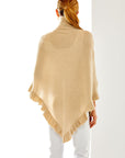 Dune cashmere wrap with ruffle edge. Perfect for everyday wear and as a cocktail attire accessory