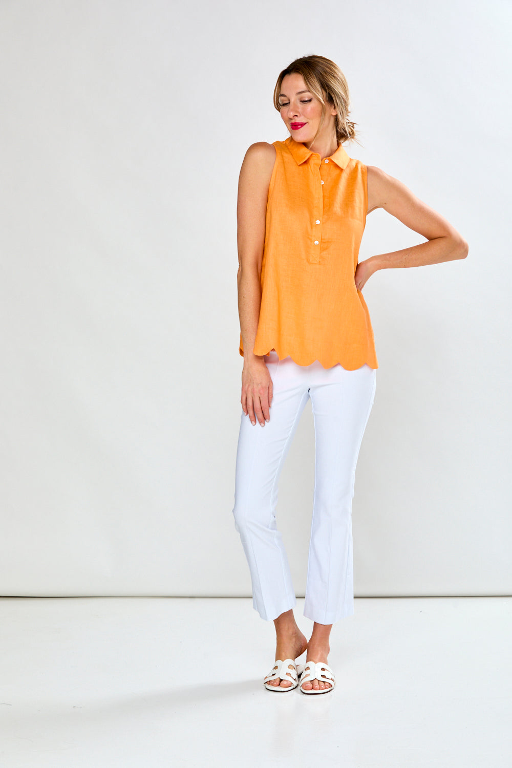 Woman in mandarin sleeveless blouse