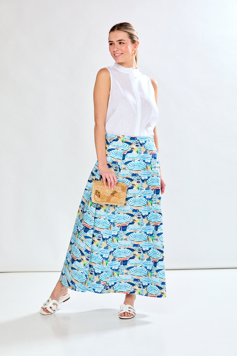 Woman in blue printed skirt