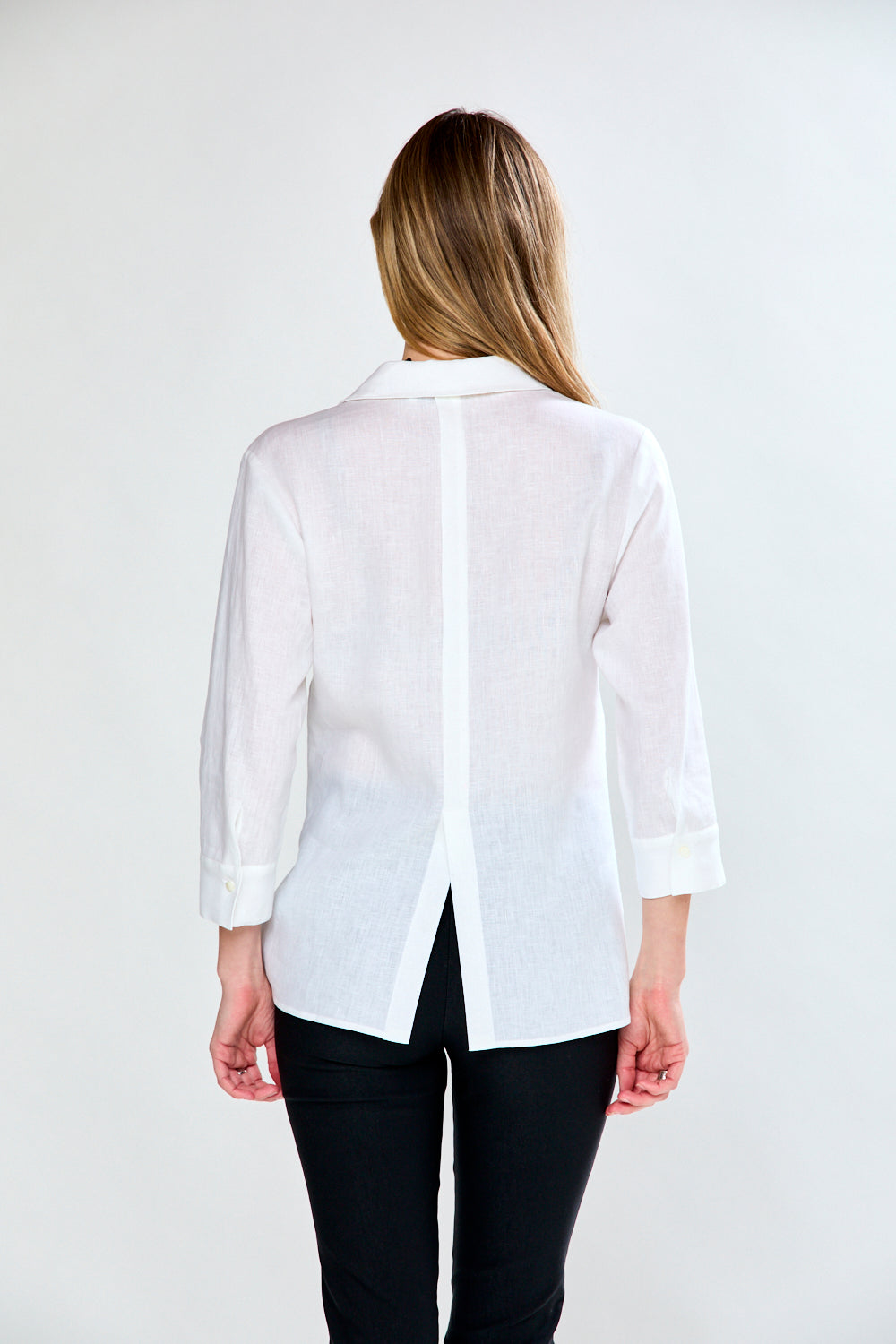 Woman in pleat back blouse