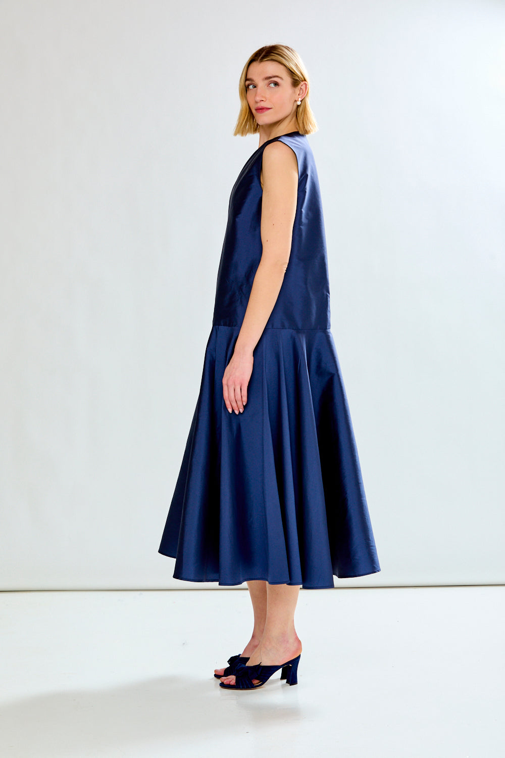 woman in navy dress