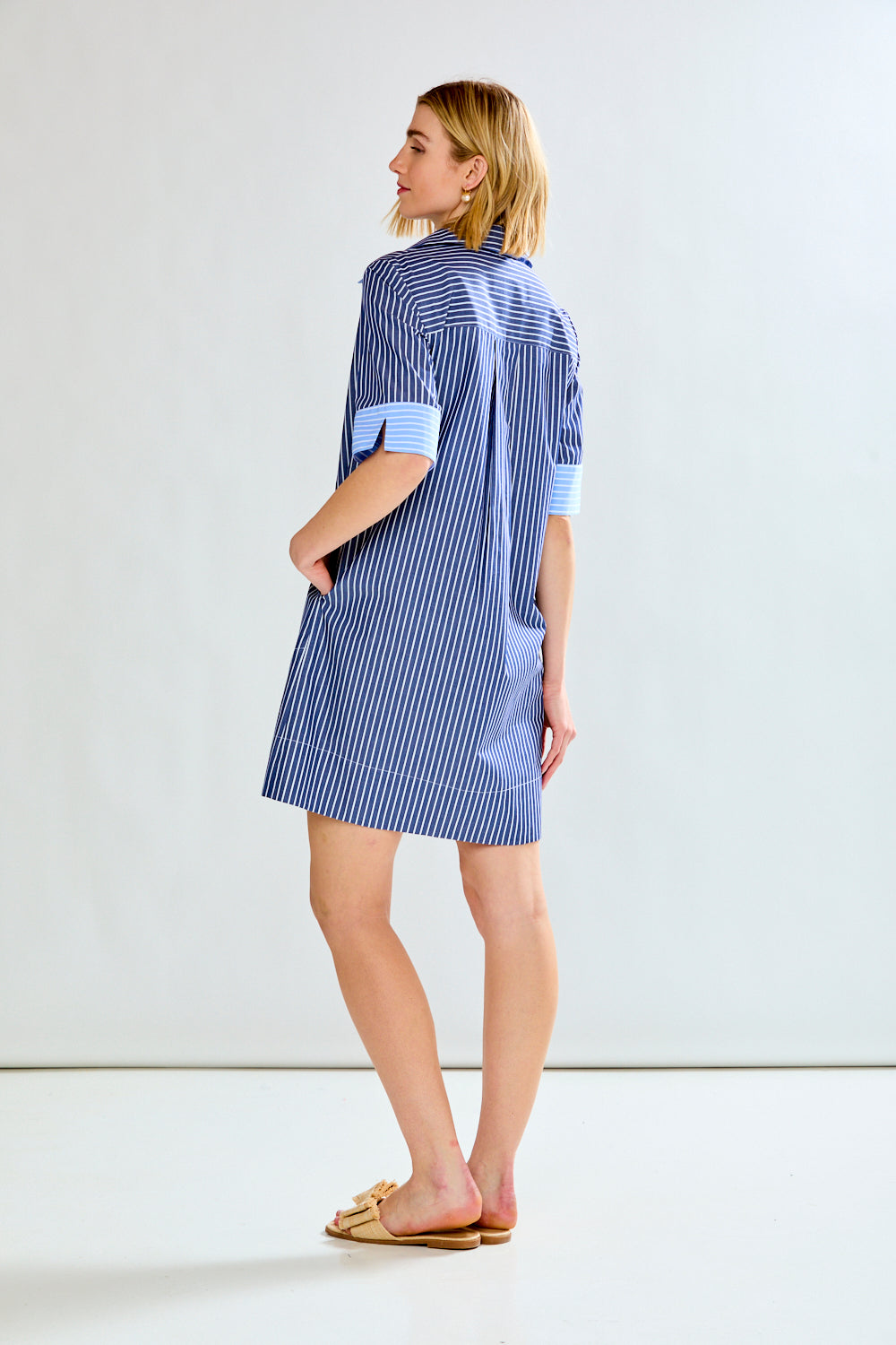 Woman in blue striped dress
