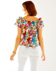Woman in floral print top