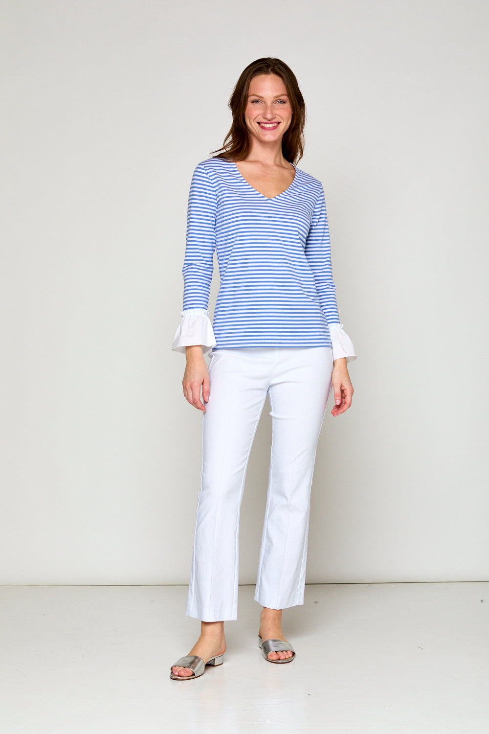 Woman in blue and white stripe top