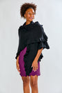 Woman wearing a black ruffle cashmere wrap