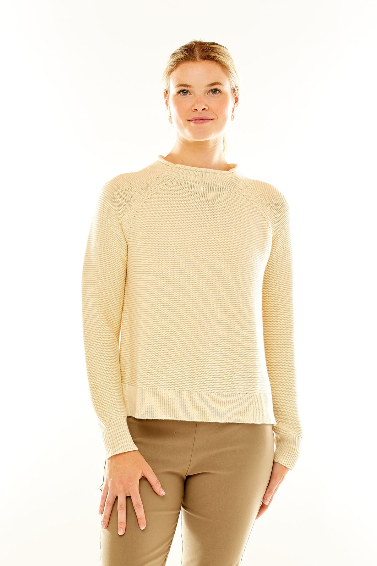 Woman in an ivory sweater