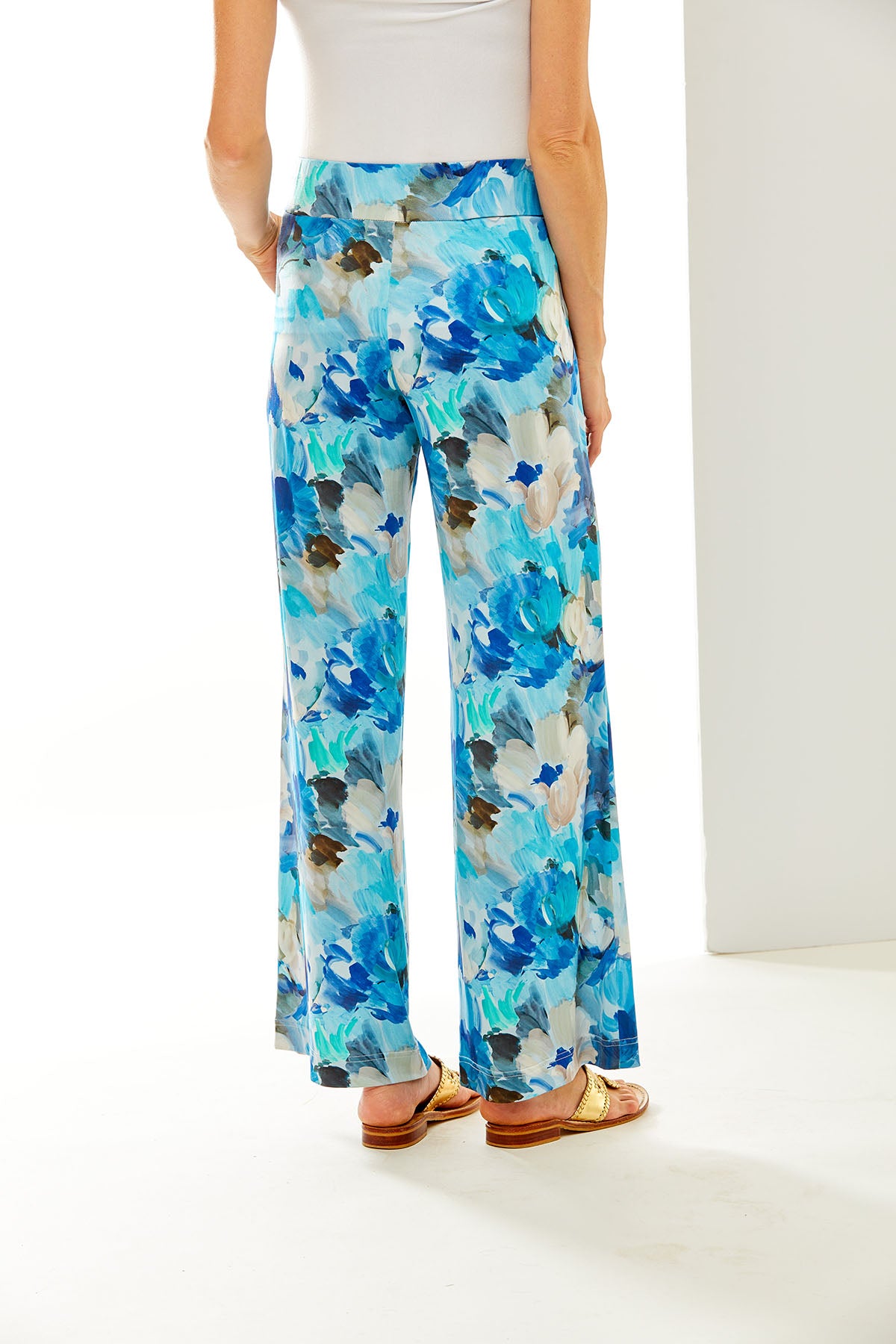 Woman in blue floral pants