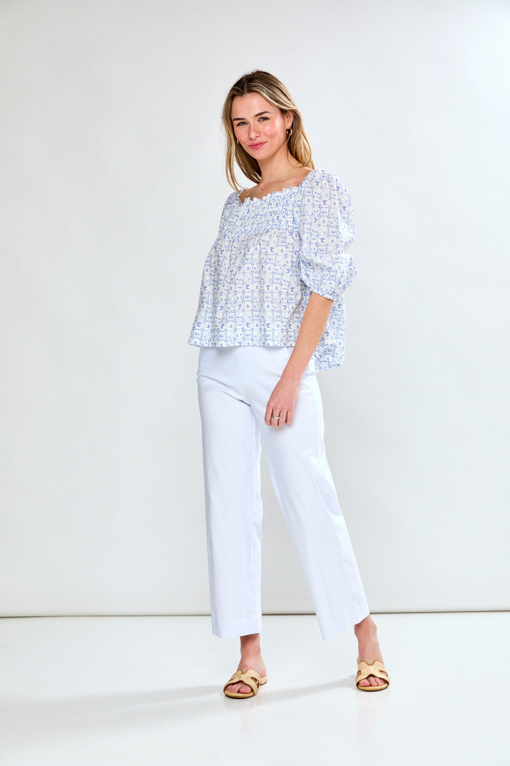 Woman in printed blue top