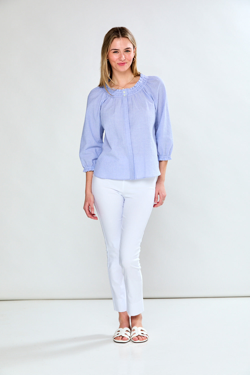 Woman in seersucker blouse