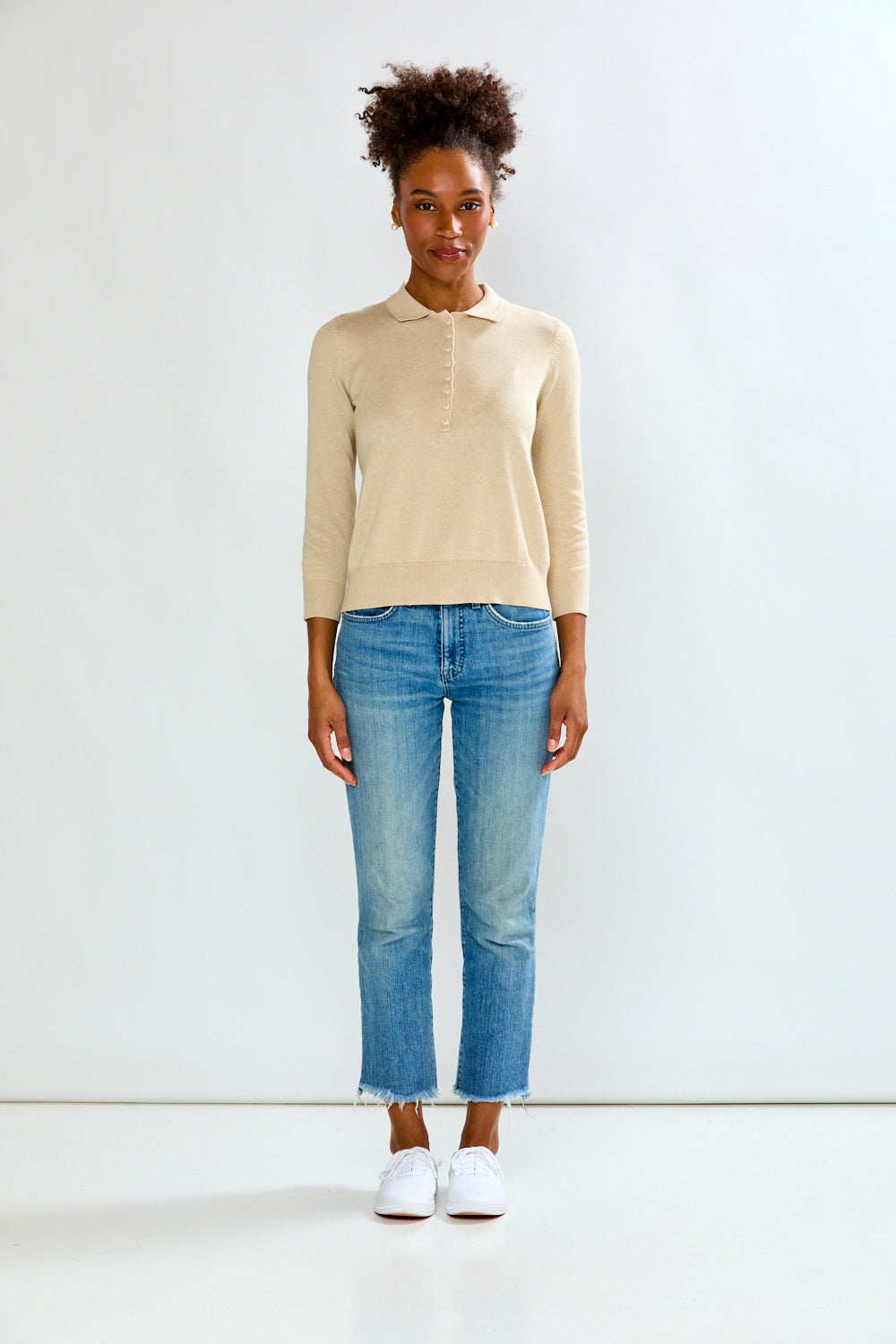 woman in sand sweater