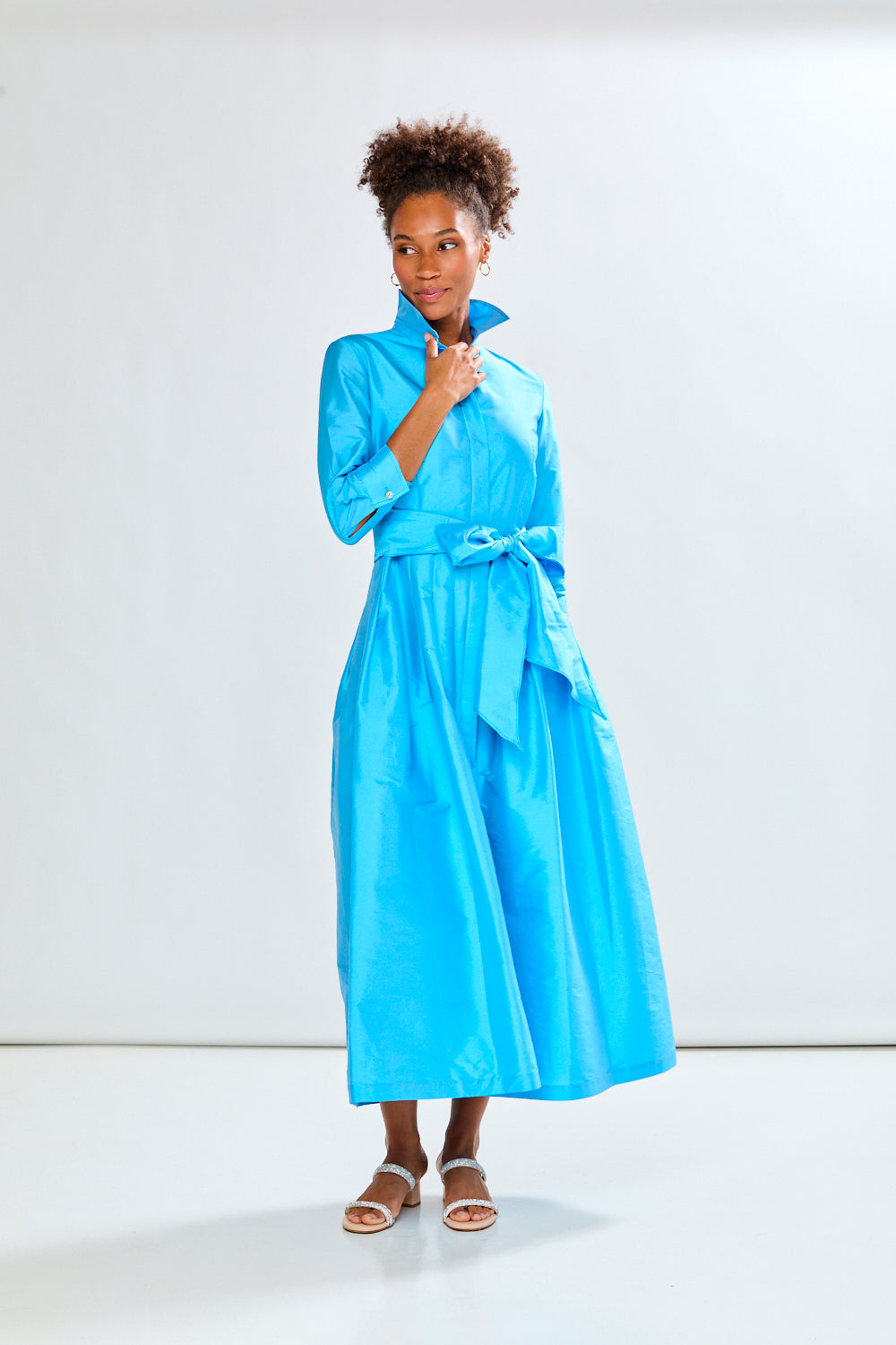 Woman in capri long taffeta dress