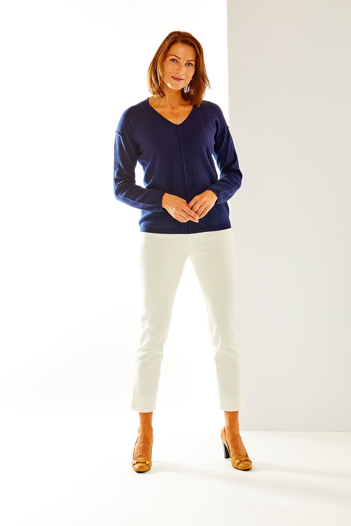 Woman in navy cashmere sweater