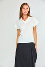 Woman wearing The Odessa Top in White
