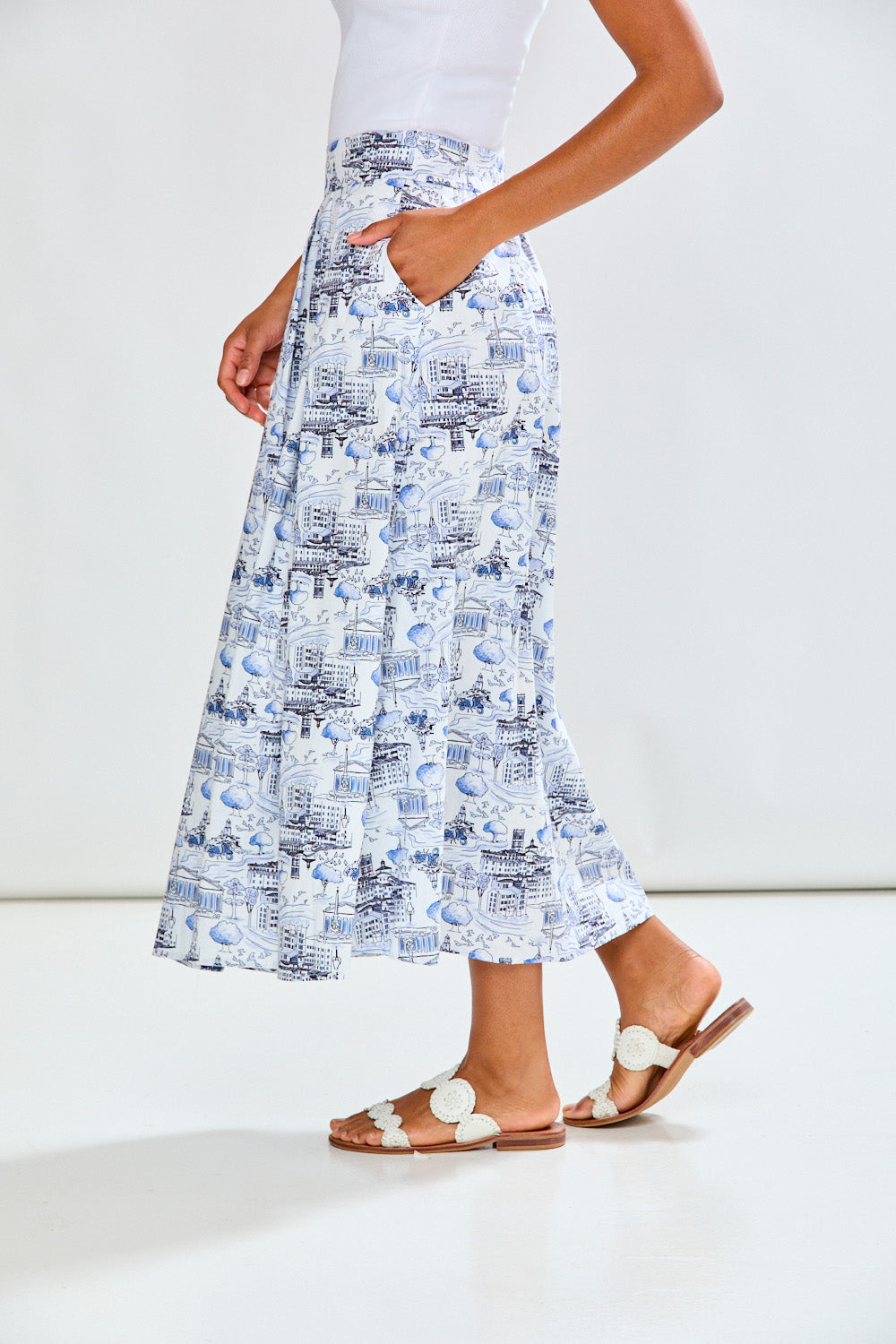 Woman wearing a blue patterned skirt 