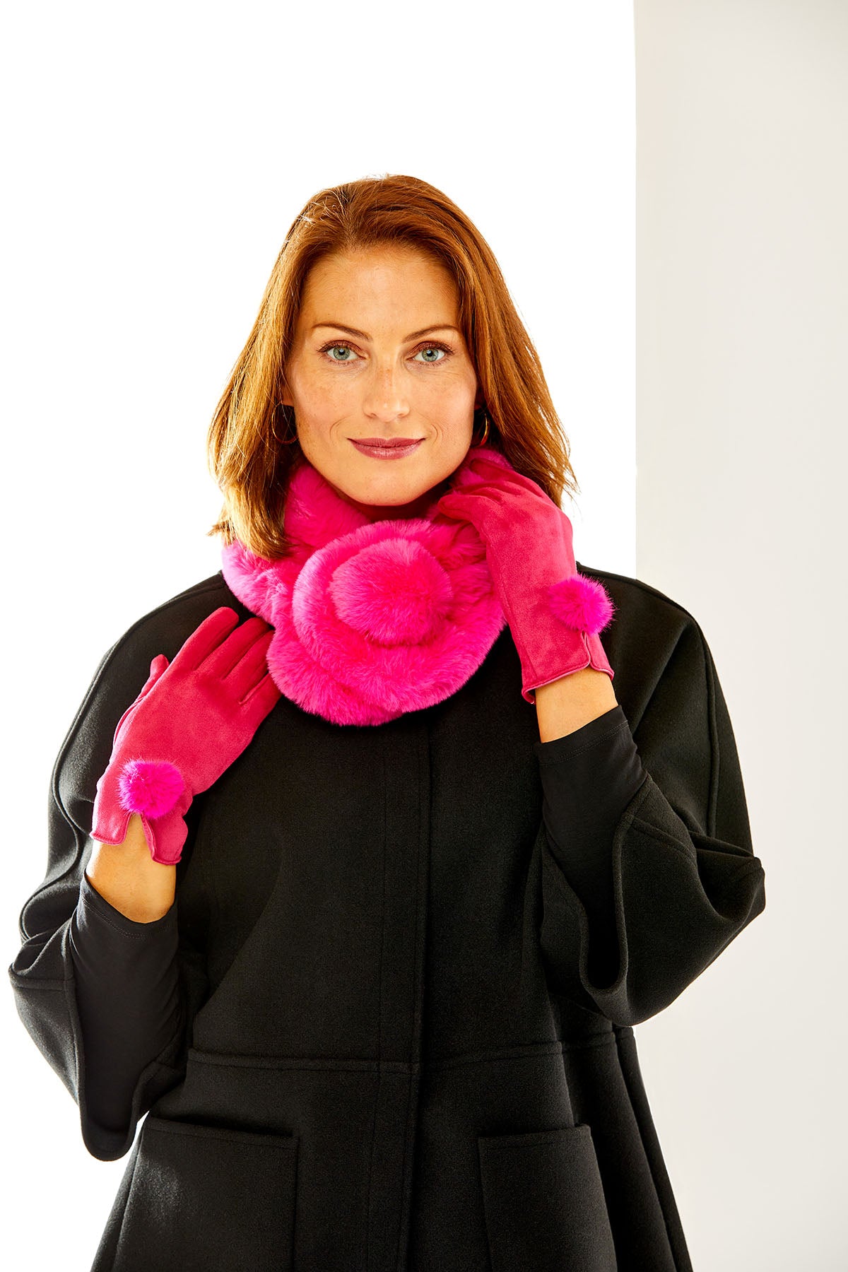 woman in hot pink faux fur scarf