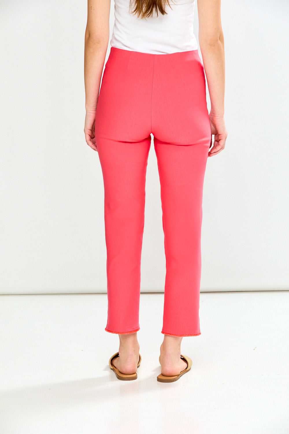 Person wearing Guava pants on a white background