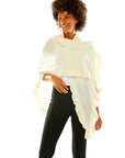 Ivory cashmere wrap with ruffle edge. Perfect for everyday wear and as a cocktail attire accessory