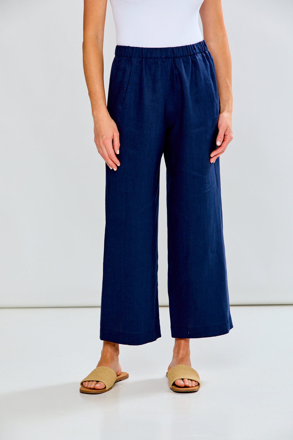 Woman wearing The Alessandra Pant - Navy
