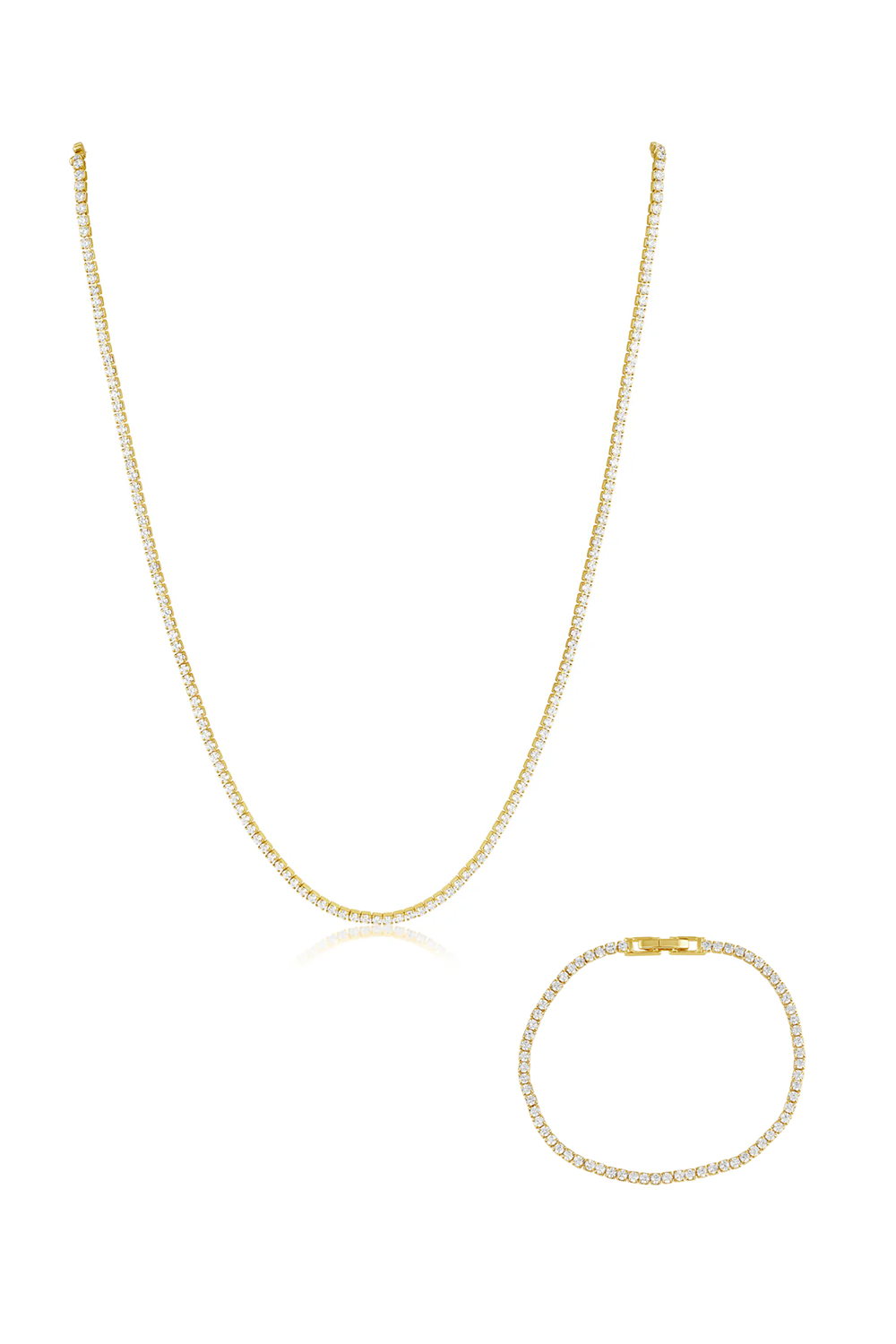 Gold necklace and bracelet set on a white background