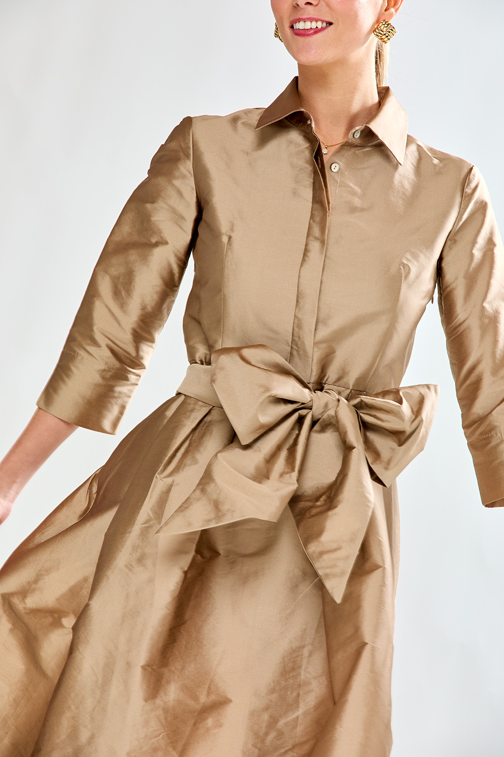 Woman in mocha taffeta dress