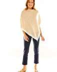 Woman in sand poncho
