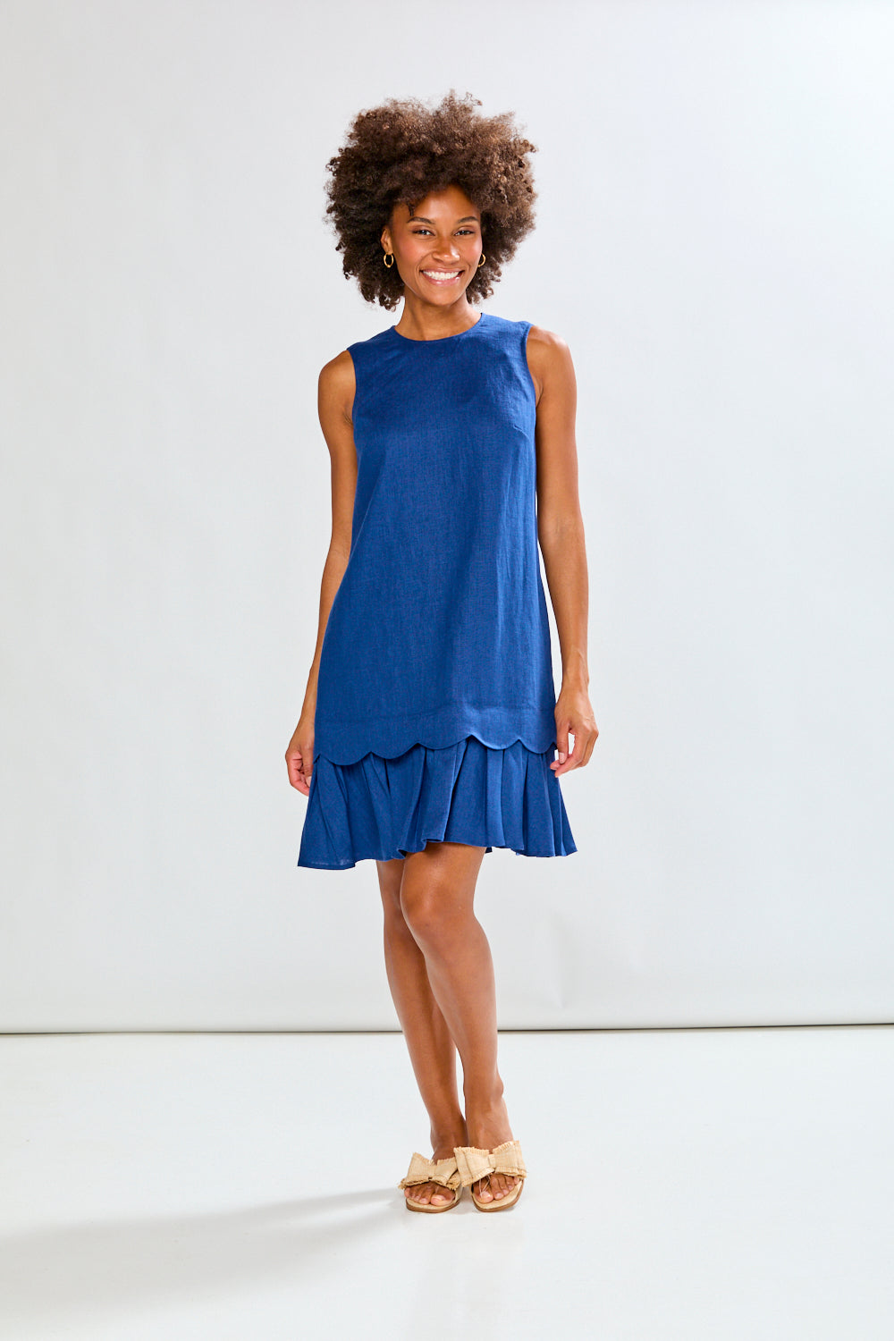 Woman wearing The Cassie Dress in Admiral Blue