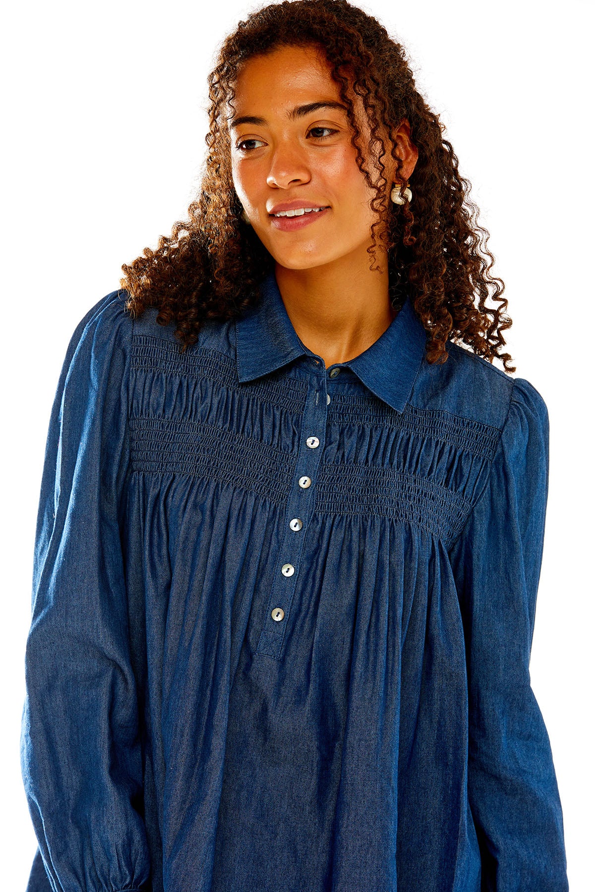 Woman in chambray shirt