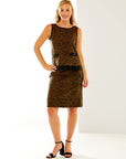 Woman in camel mini skirt with pockets