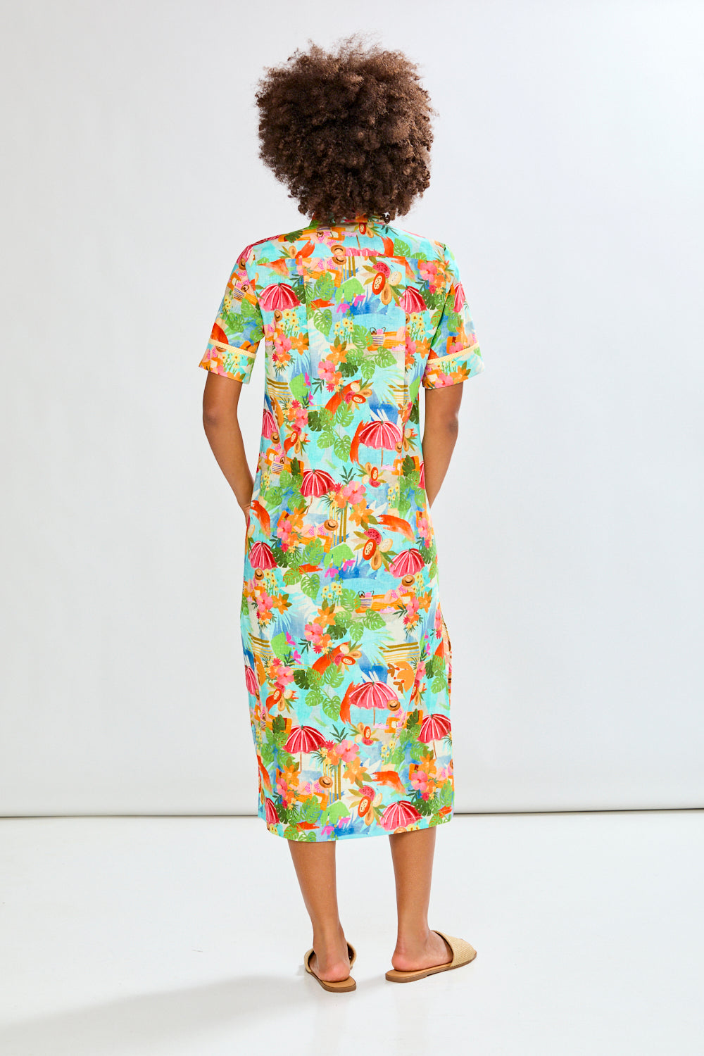Woman in tropical full length dress
