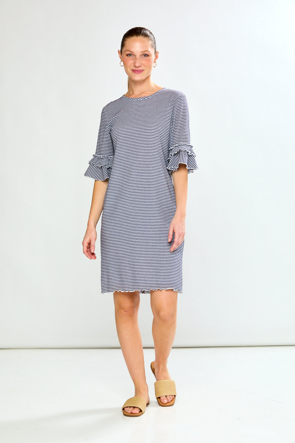 Woman wearing The Maldives Dress in Stripe in Navy & White Stripes