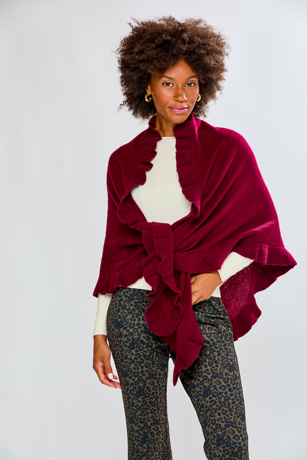 Woman wearing a raisin ruffle cashmere wrap
