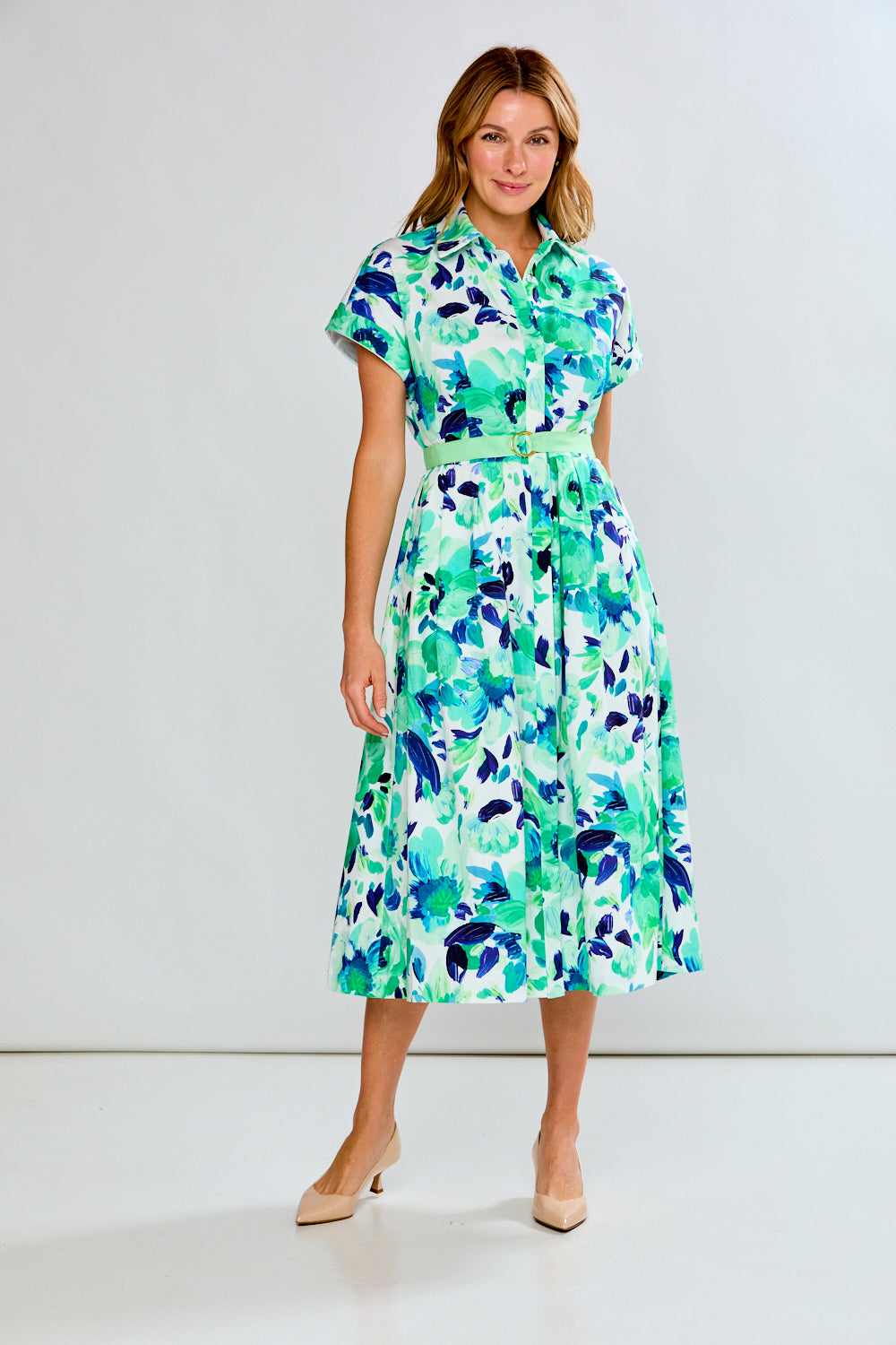 woman in green floral dress