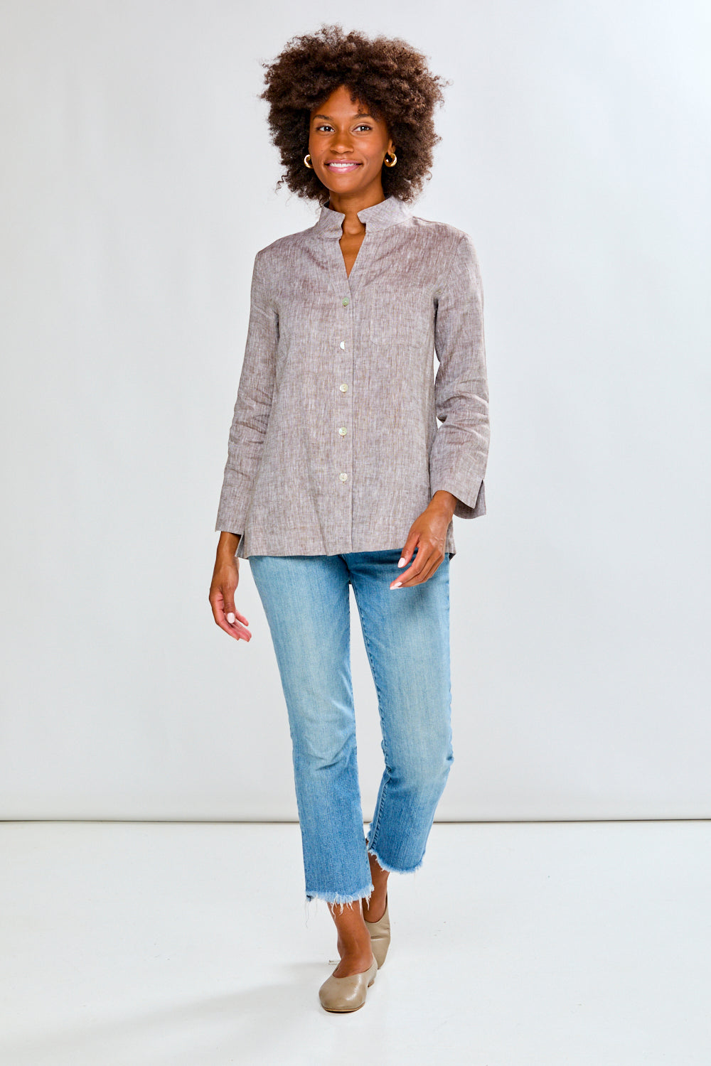 Woman in mocha linen top with jeans
