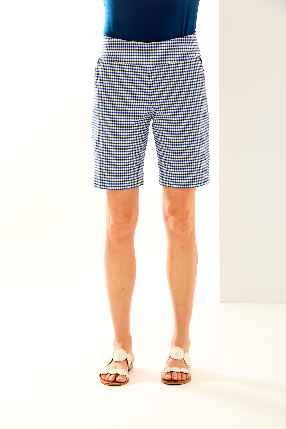 Woman in check slash pocket short