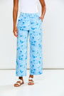 Woman wearing The Willow Pant - Denim Floral