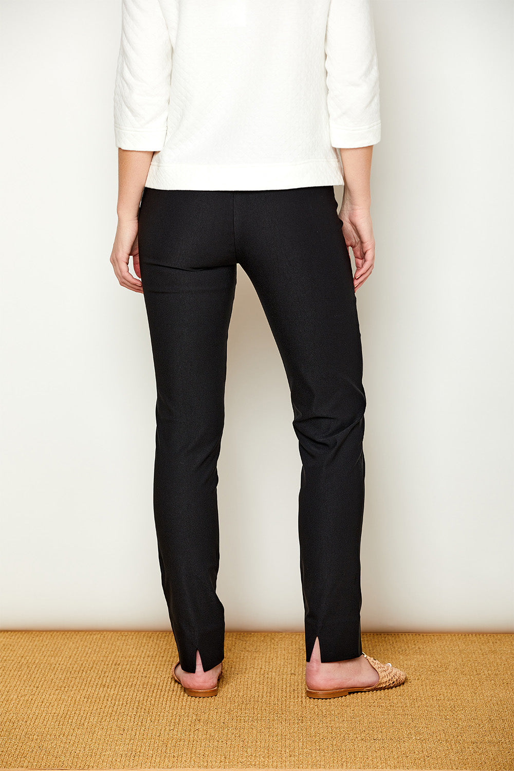 woman in black pants