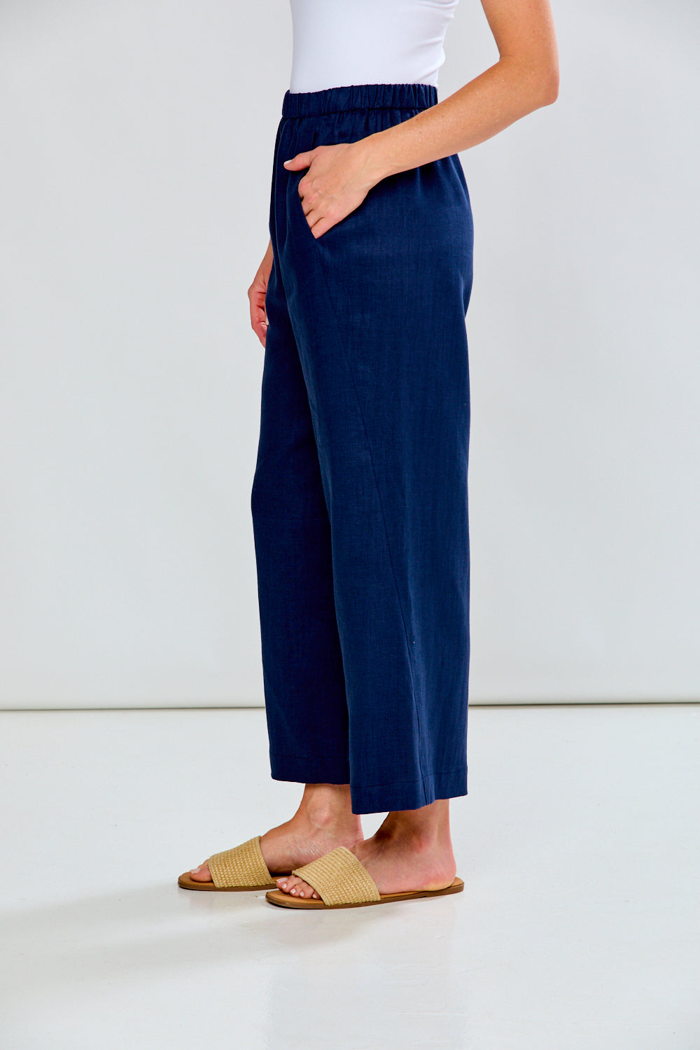 Woman wearing The Alessandra Pant - Navy