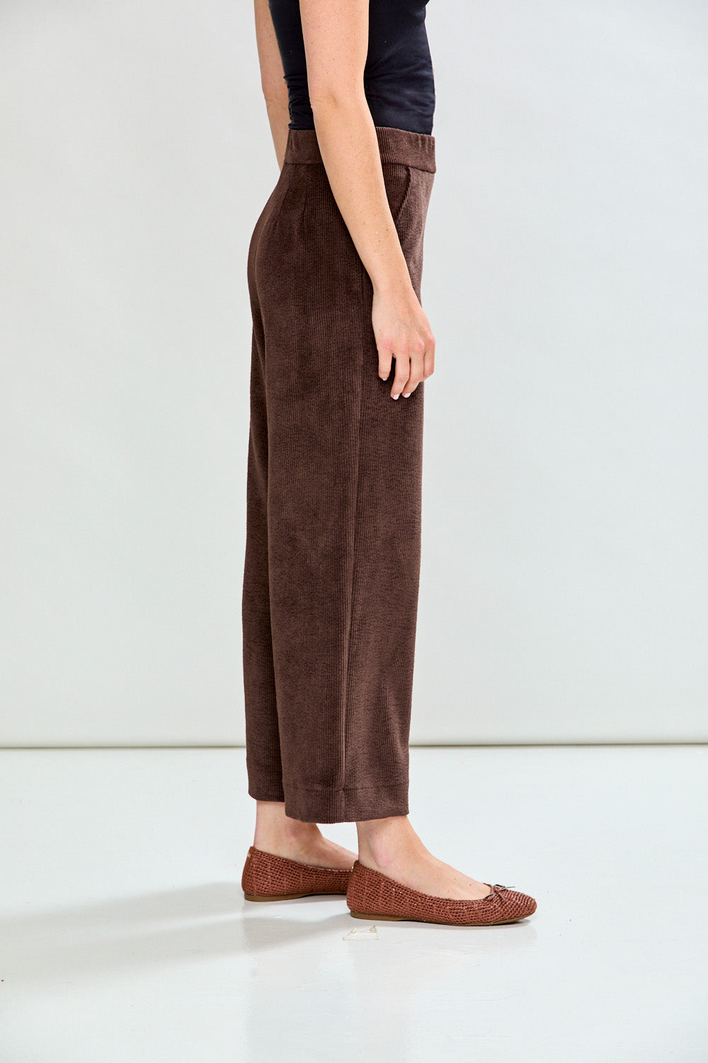 Woman in espresso corduroy pant