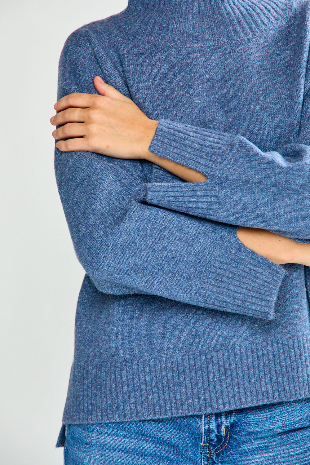 Woman in denim sweater with jeans