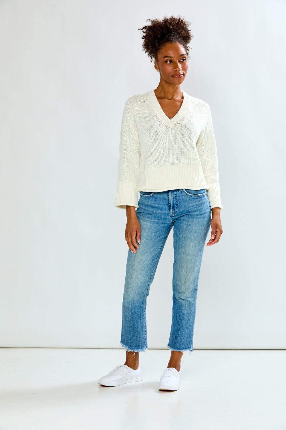 Girl in sand sweater