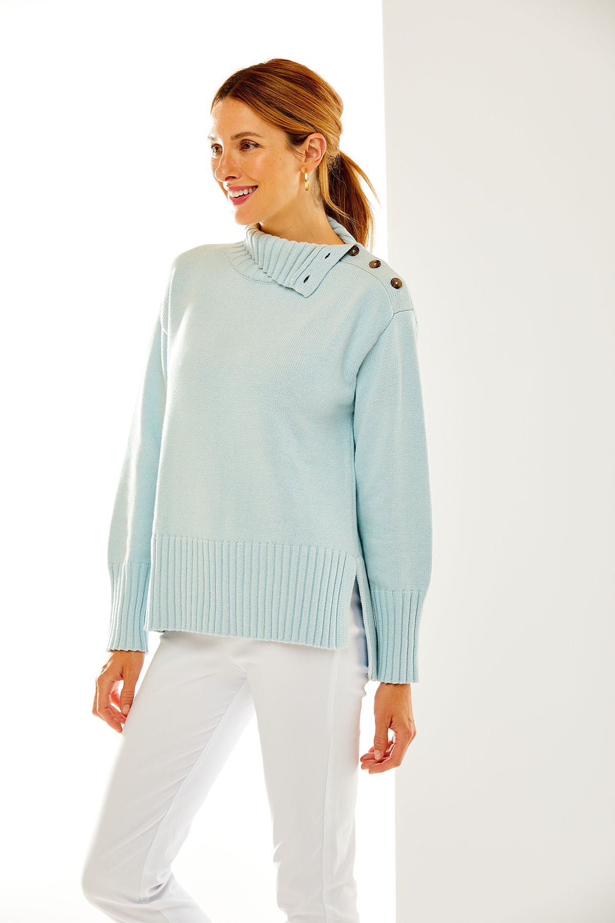 Woman in light blue sweater