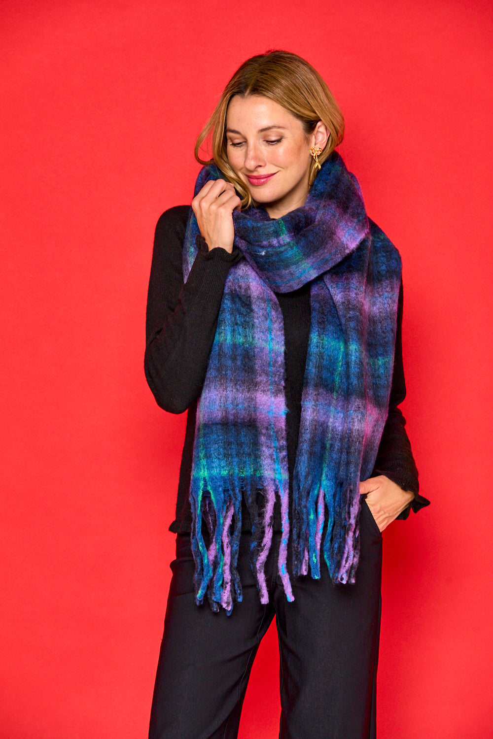 Woman in navy blanket scarf