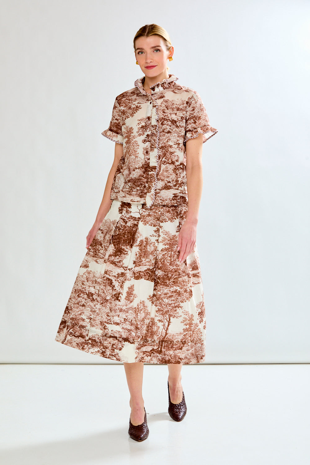 woman in brown toile top