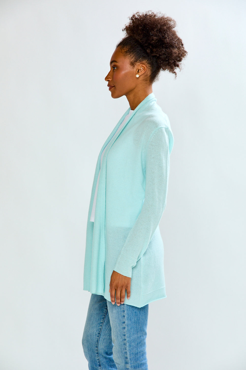 woman in sea glass sweater